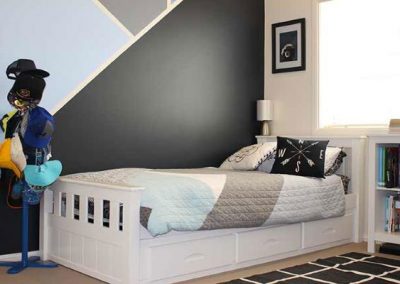 Boys bedroom with painted geometric shaped wall art