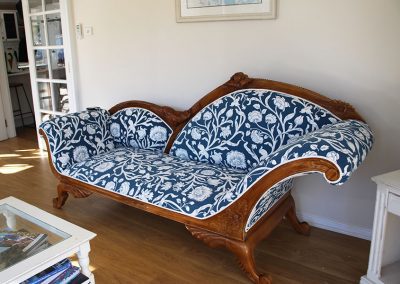 Sustainable Interior Design A Chaise lounge with modern floral fabric